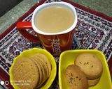 A picture of step 2 of Ginger Tea with biscuit's.