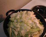A picture of step 4 of Fried Cabbage w/ Bacon, Garlic, and Onions.