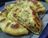 A picture of step 18 of Aloo kabab naan without oven serve with raita.