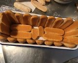 Une image de l'étape 8 de Charlotte à la rhubarbe et pralines roses.