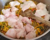 Foto del paso 3 de la receta: Arroz meloso con rape, ajetes y alcachofas