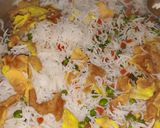 A picture of step 7 of Eggs and vegetable fried rice.