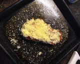 Foto del paso 3 de la receta: Milanesa a la napolitana con fritas