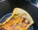 A picture of step 9 of Baked Tilapia Fish served with rocket leaves.