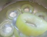 A picture of step 5 of Lauki rings with burfi.