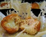 A picture of step 16 of Mozzarella Stuffed Cottage Cheese Balls Served In Parmasean Cheese Basket.