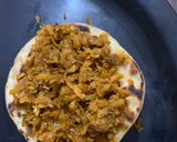 A picture of step 4 of Gajar Chunda oats beans aloo tikki fig chutney sandwich in Indian bread.