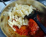 A picture of step 4 of Cheese tomato macaroni pasta.