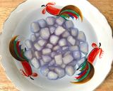 A picture of step 3 of Tubtim Krob in Butterfly Pea Flower Tea Latte.