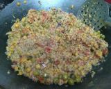 A picture of step 2 of Wheat Daliya Pulao.