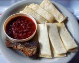 A picture of step 1 of Yam Fingers,Sweet Chilli Pepper Sauce and Fried Fish.