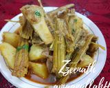 A picture of step 4 of Hyderabadi Aaloo Gosht Sojni Ki Phalli.