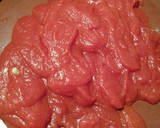 Foto del paso 6 de la receta: Pimientos rellenos de ternera en salsa de tomate