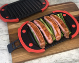 Foto del paso 6 de la receta: Salchichas con pimientos en Lékué Grill acompañadas de raviolis y ensalada