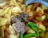 A picture of step 11 of Aloo karhai.