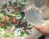 A picture of step 4 of Leftover fried rice in cabbage cups.