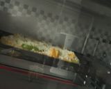 A picture of step 9 of Butter Paneer pizza.