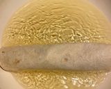 A picture of step 3 of Rotisserie Chicken flautas.