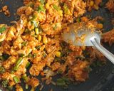 A picture of step 4 of Malaysian chicken fried rice.