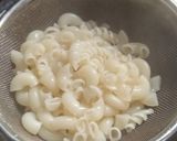 A picture of step 1 of White and chocolate Pasta dessert.