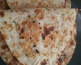 A picture of step 7 of No meat Tikkie stuffed naan with mayo-ketchup layering.