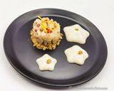Foto del passaggio 5 della ricetta Tartare di Branzino al Pepe Rosa e Cipolle di Breme