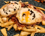 Foto del paso 6 de la receta: Huevos rotos con trufa negra y jamón ibérico