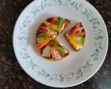 A picture of step 6 of Bhakri pizza.