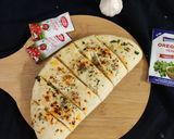 A picture of step 5 of Cheese stuffed garlic bread (Domino's style).