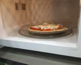 A picture of step 8 of Onion capcicum tomato pizza.