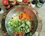 A picture of step 2 of Spicy cabbage, carrot and cucumber pickle.