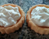 Foto del paso 5 de la receta: Bizcochos rellenos de pera con nata y chocolate