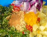 A picture of step 8 of Dambu shinkafa with veg.sauce.