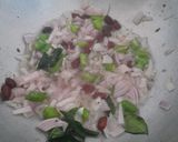 A picture of step 2 of Kande (onion) pohe.