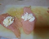 A picture of step 2 of Chicken cordon bleu.