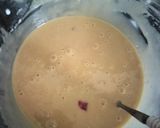 A picture of step 2 of Christmas special heart shape eggless plum cake.