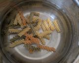 A picture of step 1 of Chicken and bacon pasta salad.