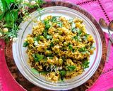 A picture of step 7 of Moong Matar Khichdi with Gajar Halva.