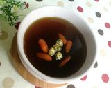 A picture of step 4 of Healthy Tea Drink ~ Chrysanthemum, Goji Berry, and Winter Melon Tea.