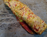 Foto del paso 7 de la receta: Brazo de verduras con huevo, jamón y queso