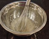 A picture of step 3 of Coconut Macaroon s with a Chocolate Center.