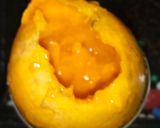 A picture of step 2 of Mango stuffed kulfi.