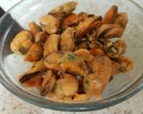 A picture of step 1 of Marinated mussels with spinach, spring onion noodles. 😊.