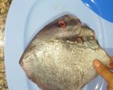 A picture of step 1 of Meen pollichathu/ Fish fried in banana leaf wrap.
