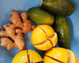 A picture of step 1 of Cucumber ginger and orange juice.