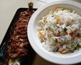 A picture of step 3 of Coconut rice and fish.