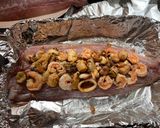 Foto del paso 2 de la receta: Pescado Relleno con Mariscos bañado en salsa de ají Amarillo