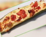 A picture of step 3 of Feta and tomato stuffed courgettes.