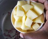 A picture of step 2 of Aloo Pulao (potato rice).