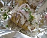 A picture of step 4 of Garlic Parmesan Hasselback Potatoes.